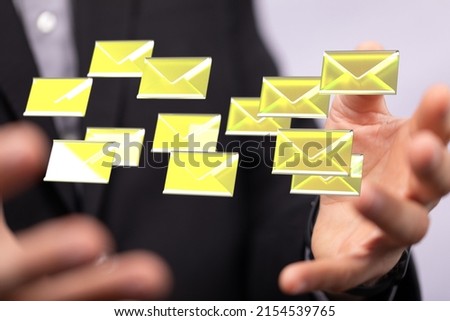 A 3D rendered  abstract shot, of a man's hand touching digital email and message icons on the web