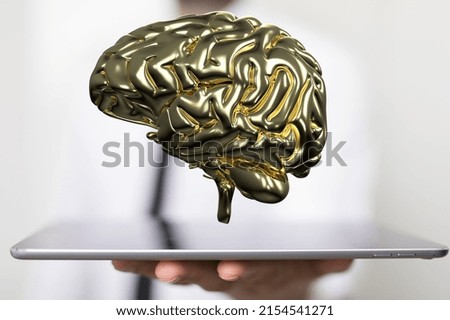 A closeup of illustrated brain near a tablet