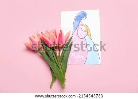 Picture with text LOVE YOU MOM and tulips on pink background