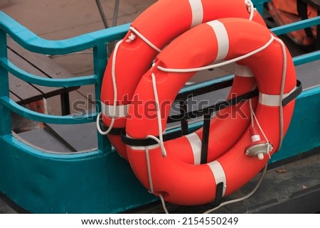 red life buoys on board the ship. High quality photo