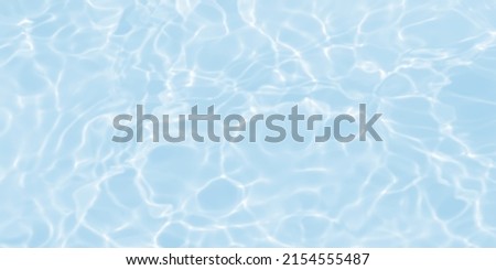 de-focused. Closeup of light blue transparent clear calm water surface texture with splashes and bubbles. Trendy abstract summer nature background. for a product, advertising,text space. Royalty-Free Stock Photo #2154555487