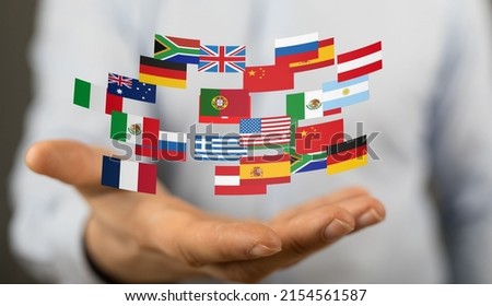 A 3d rendering design of a group of many flags of different countries in a man's hand