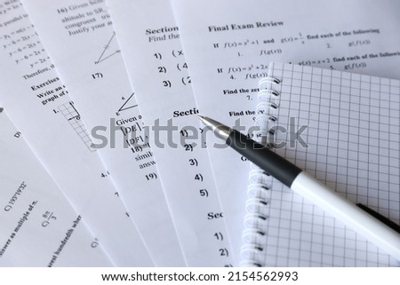 Handwriting of mathematics quadratic equation on examination, practice, quiz or test in maths class. Solving exponential equations background concept. Royalty-Free Stock Photo #2154562993