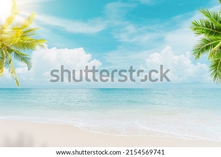Palm tree on tropical beach with blue sky and white clouds abstract background. Copy space of summer vacation and business travel concept. Vintage tone filter effect color style. Royalty-Free Stock Photo #2154569741