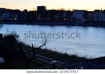 longtime exposure of the river "Inn"during sunset in Passau, Germany Royalty-Free Stock Photo #2154571917