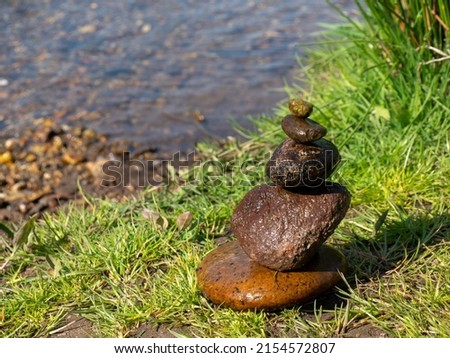 Background balance stones on a river