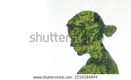 Save forest. Ecology problem. Nature conservation. Double exposure profile silhouette of upset depressed girl face with green trees foliage isolated on white empty space. Royalty-Free Stock Photo #2154584849