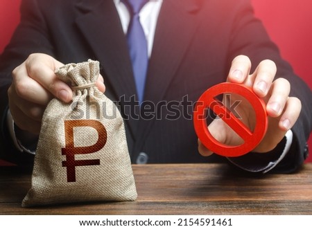 Man refuses to give out russian ruble money bag. Financial difficulties. Asset freeze seizure. Economic sanctions, confiscation of funds. Refusal to provide a loan, bad credit history. Royalty-Free Stock Photo #2154591461