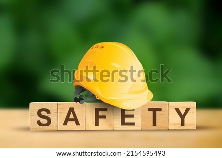 safety first, construction concept, Yellow safety hard hat