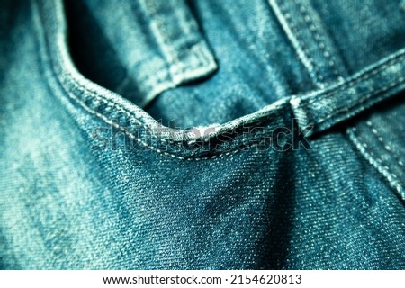 abstract background with close-up of jeans pocket