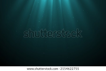 Vector Light Rays in Dark Turquoise Underwater Ocean Background. Deep Sea Stormy Water with Plankton Dust Particles. Sun Light Beams Illuminating Darkness Ocean Depths Royalty-Free Stock Photo #2154622755