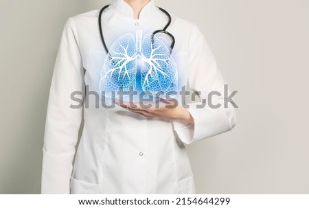 Lungs issues medical concept. Photo of female doctor, empty space.  Royalty-Free Stock Photo #2154644299