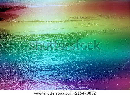 View of frozen water on lake with added rainbow colors