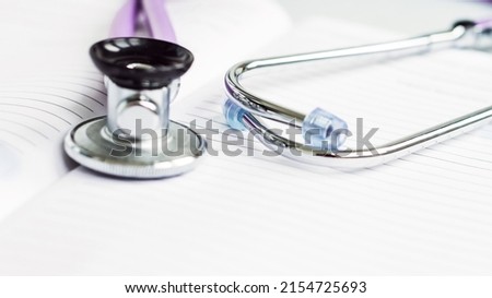 Blank Note Pad and Stethoscope. Medical concept