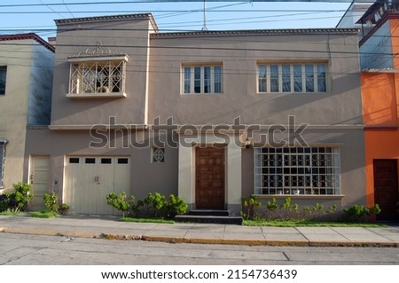 suburban home exterior Facades of Peruvian Houses in Lima, Peru Royalty-Free Stock Photo #2154736439