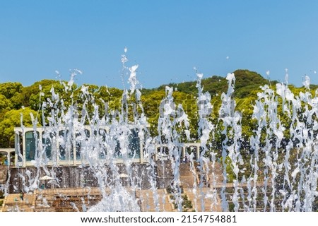 A fountain in a park that splashes