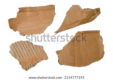 Brown ripped cardboard strips collection isolated on a white background