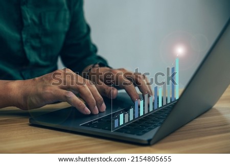 Business finance technology and investment concept, Man typing keyboard on laptop or computer.