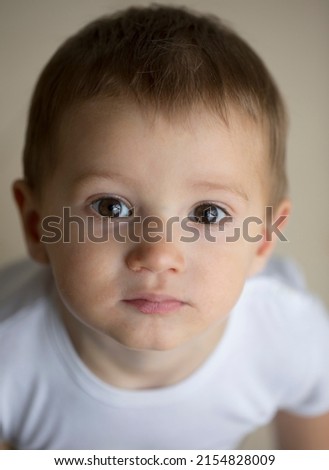   Child with Cute Face Isolated on White. Little Boy Smile with Fresh Skin.  Beauty Kid with Fresh Look and Blond hair Royalty-Free Stock Photo #2154828009