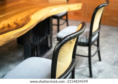 Set of classic style chair with crafted bamboo backrest part. Interior decoration object photo. Selective focus.