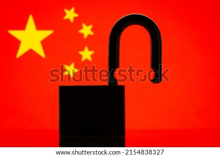 Silhouette of open lock on the background of flag of China. Reopen country, hospitality, travel concept Royalty-Free Stock Photo #2154838327