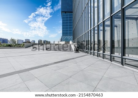 Empty square floor and city skyline with modern commercial buildings in Shanghai, China.