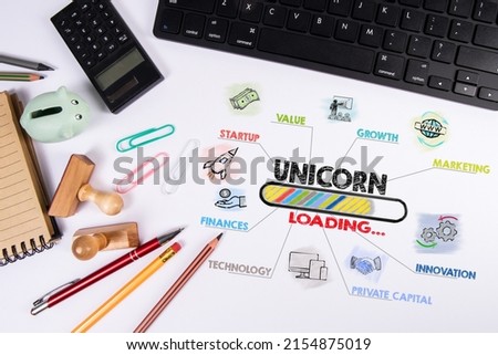 UNICORN, business concept. Computer keyboard on office desk. Royalty-Free Stock Photo #2154875019