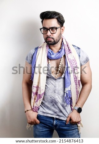 Young Indian Man in a fashionable Look Handsome Man Wearing Sunglasses Fashion Concept