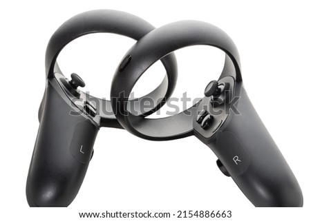 Close-up of the two joysticks from the virtual reality glasses isolated on a white background. The controllers of the VR helmet Royalty-Free Stock Photo #2154886663