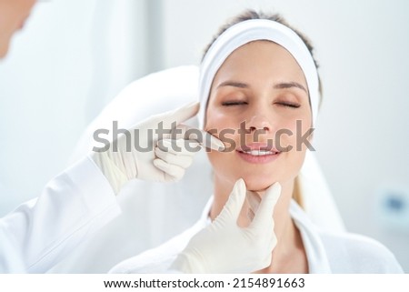 A scene of medical cosmetology treatments botulinum injection. Royalty-Free Stock Photo #2154891663