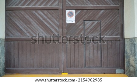 Weathered brown timbers garage door