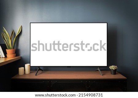 TV led mock up screen. Smart TV on a curbstone in an interior of the living room Royalty-Free Stock Photo #2154908731