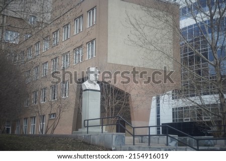 Russia. Yekaterinburg, April 2022. Editorial. Full-color horizontal photo. A monument to the composer Pyotr Ilyich Tchaikovsky stands near the music school in Yekaterinburg.
