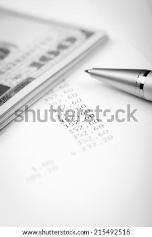 Business Photography: macro of dollars and loan plan