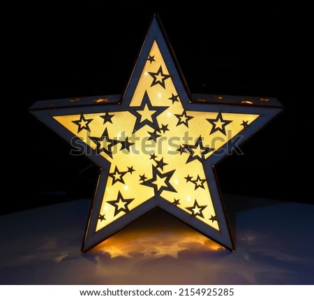wooden star with lights .decorative
