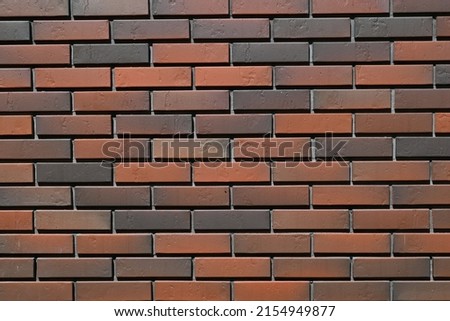 Beautiful decorative tile wall background material. Brown brick wall background