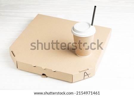 Cup of Coffee and pizza in box