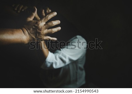 Aggression in the family, man beating up his wife. Domestic violence concept. Royalty-Free Stock Photo #2154990543
