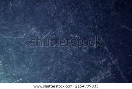 Background texture stained surface. Used school blackboard, worn, full of grooves, marks, stains. Beaten by time. Used dark blue. Backdrop. Design resource, trendy. Blank image, empty.