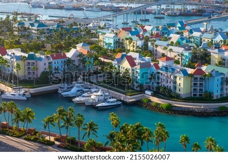 Harborside Villas aerial view at Nassau Harbour with Nassau downtown at the background, from Paradise Island, Bahamas. Royalty-Free Stock Photo #2155026007