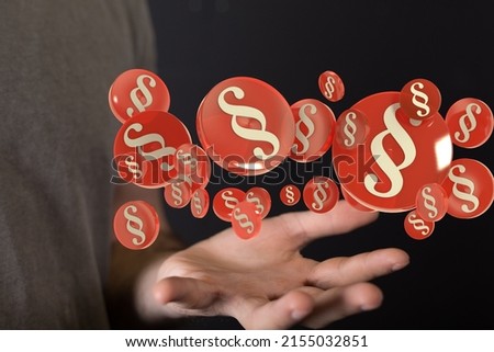 A 3D render of section signs levitating above a person's hand