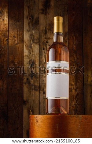 bottle of pink dry varietal wine from Cabernet Sauvignon french grape sort with blank label, no brand mockup, advertising template. Copy space