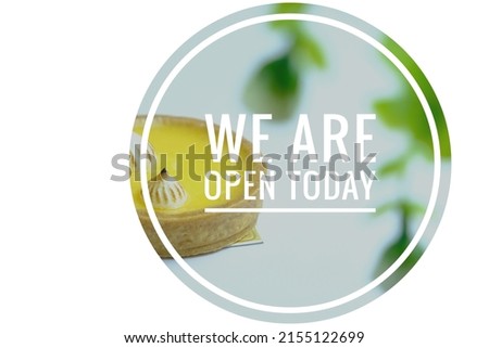 open today word concept with white and food background, soft focus