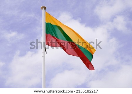 flag Lithuania Lithuanian National state flag on wind mat with blue cloud sky