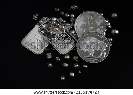 Silver bars bitcoin and silver coins for money investing                               