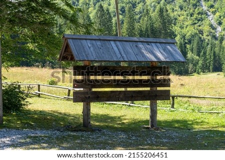 Empty wooden sign in the mountains