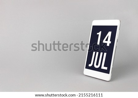 July 14th. Day 14 of month, Calendar date. Smartphone with calendar day, calendar display on your smartphone.  Summer month, day of the year concept