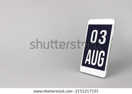 August 3rd. Day 3 of month, Calendar date. Smartphone with calendar day, calendar display on your smartphone.  Summer month, day of the year concept