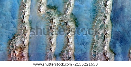 abstract landscape photo of the deserts of Africa from the air emulating the shapes and colors of primordial DNA, Genre: Abstract naturalism, from the abstract to the figurative