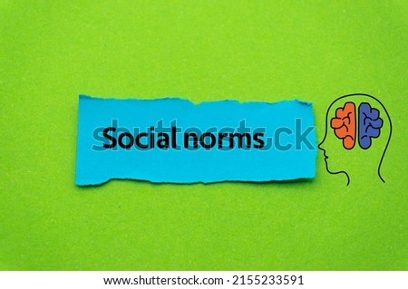 Social norms.The word is written on a slip of colored paper. Psychological terms, psychologic words, Spiritual terminology. psychiatric research. Mental Health Buzzwords. Royalty-Free Stock Photo #2155233591